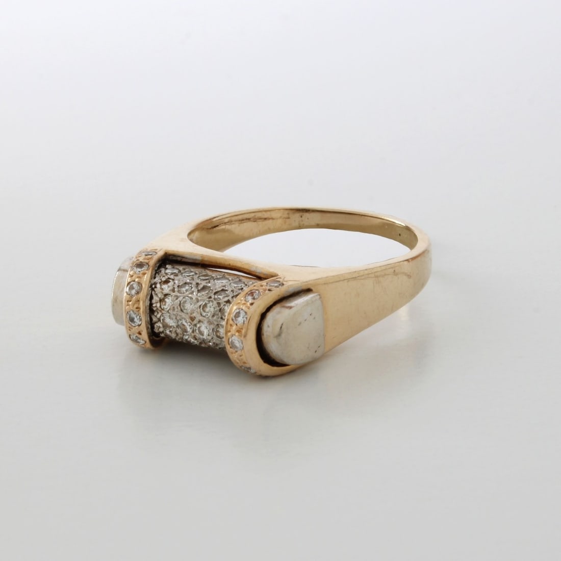 Diamond and 14K Ring: Vintage Approx. 1.0 Carat TW Pave Set Round Brilliant Cut Diamond and 14 Karat Yellow and White Gold Ring. Diamonds F-G color, VS1-VS2 clarity. Ring size 9. Approx. weight: 7.39 grams. Condition: Good