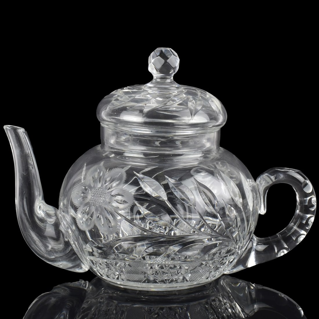 Antique Cut Glass Teapot: Antique American Brilliant Period Cut Glass Teapot. Measures: 6-3/4" high, 9" wide, 5-1/4" deep. From an important Palm Beach, Florida art collection. Kodner Galleries offers phone and absentee biddin