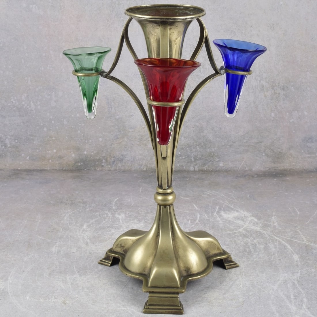 Vintage Silver Plated Epergne: Vintage Silver Plated Epergne with Green, Cranberry and Cobalt Blue Glass Inserts. Measures: 13-1/2" high, 7" diameter. Kodner Galleries offers phone and absentee bidding at a low, flat 21% buyer’s
