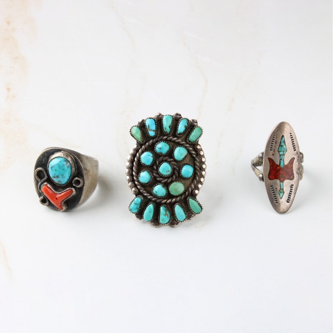Native American Silver Rings: Three Vintage Native American Red Coral, Turquoise and Silver Rings. Ring size 7-3/4, 8-1/2, 9-1/4. Approx. total weight: 41.90 grams. Condition: Good vintage condition. Need cleaning / polishing. Est