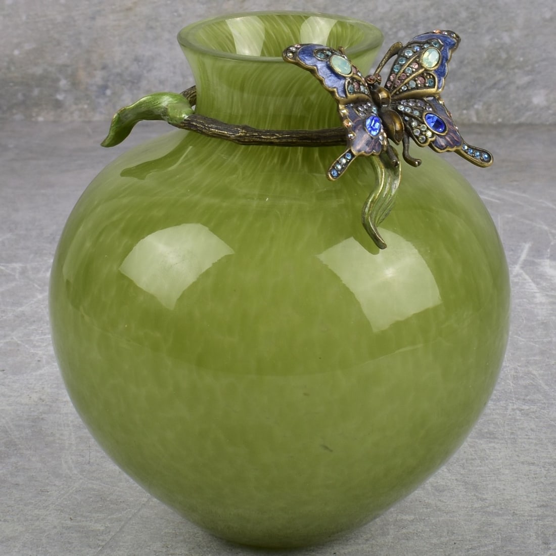 Jay Strongwater Vase: Jay Strongwater Green Glass Vase with Butterfly. Measures: 5-1/2" high, 4-3/4" diameter. Kodner Galleries offers phone and absentee bidding at a low, flat 21% buyer’s premium without surcharge or hi