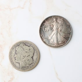 Two US Silver Dollar Coins