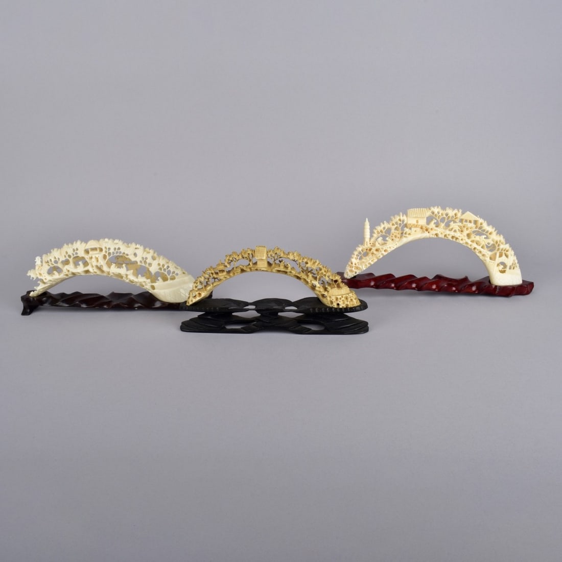 Chinese Openwork Carved Bridges: Grouping of Three (3) Chinese Openwork Carved Bridges Presented on Wooden Bases. Largest measures: 11-1/4" x 1". We Will Not Ship This Item Out of State of Florida. Anyone Having This Item Shipped Mus