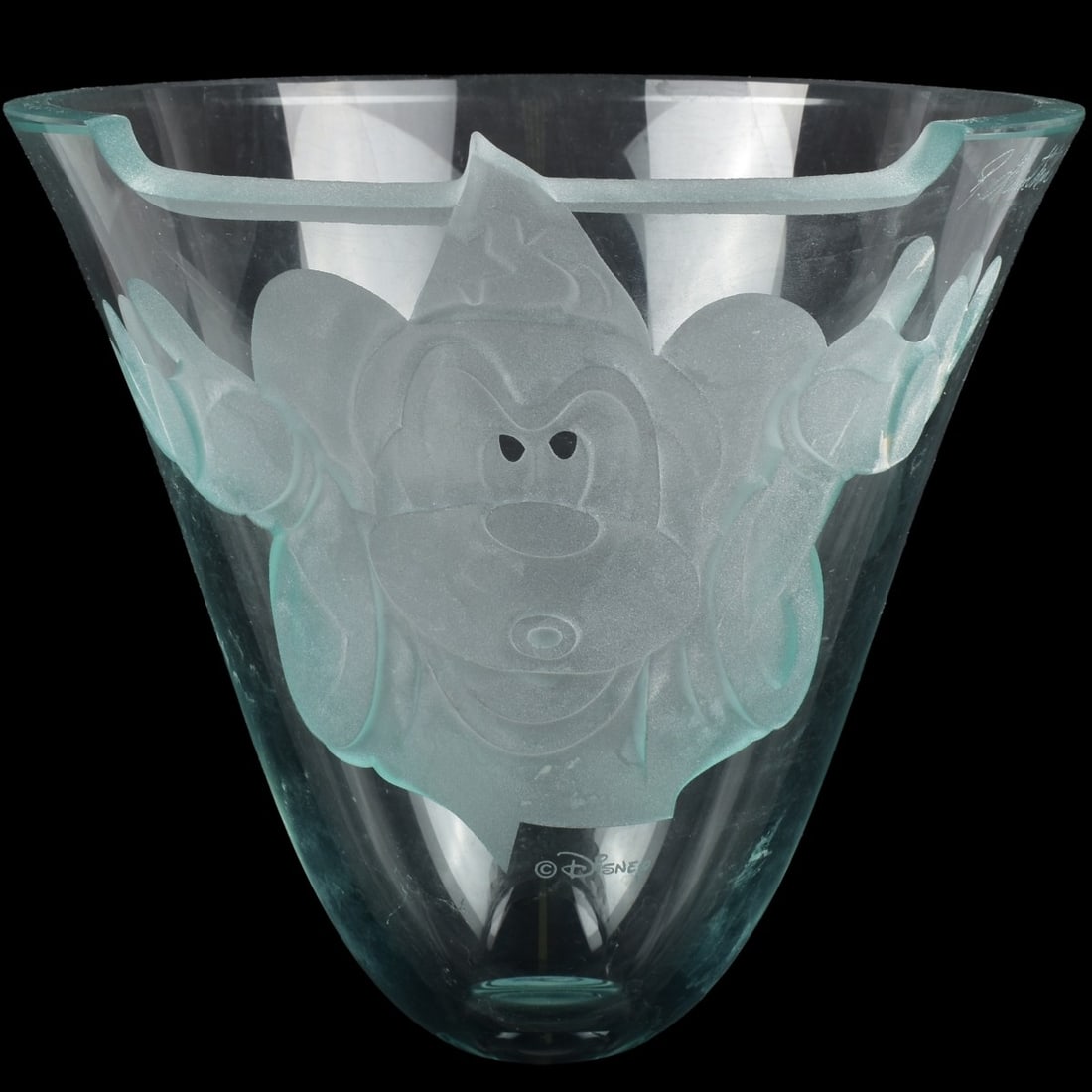 Disney Robert Guenther Sorcerer Bowl: Disney Robert Guenther Sorcerer Mickey Etched Curved Glass Centerpiece Bowl. Artist signed towards top. Measures: 7" high, 7-1/2" diameter. Kodner Galleries offers phone and absentee bidding at a low,