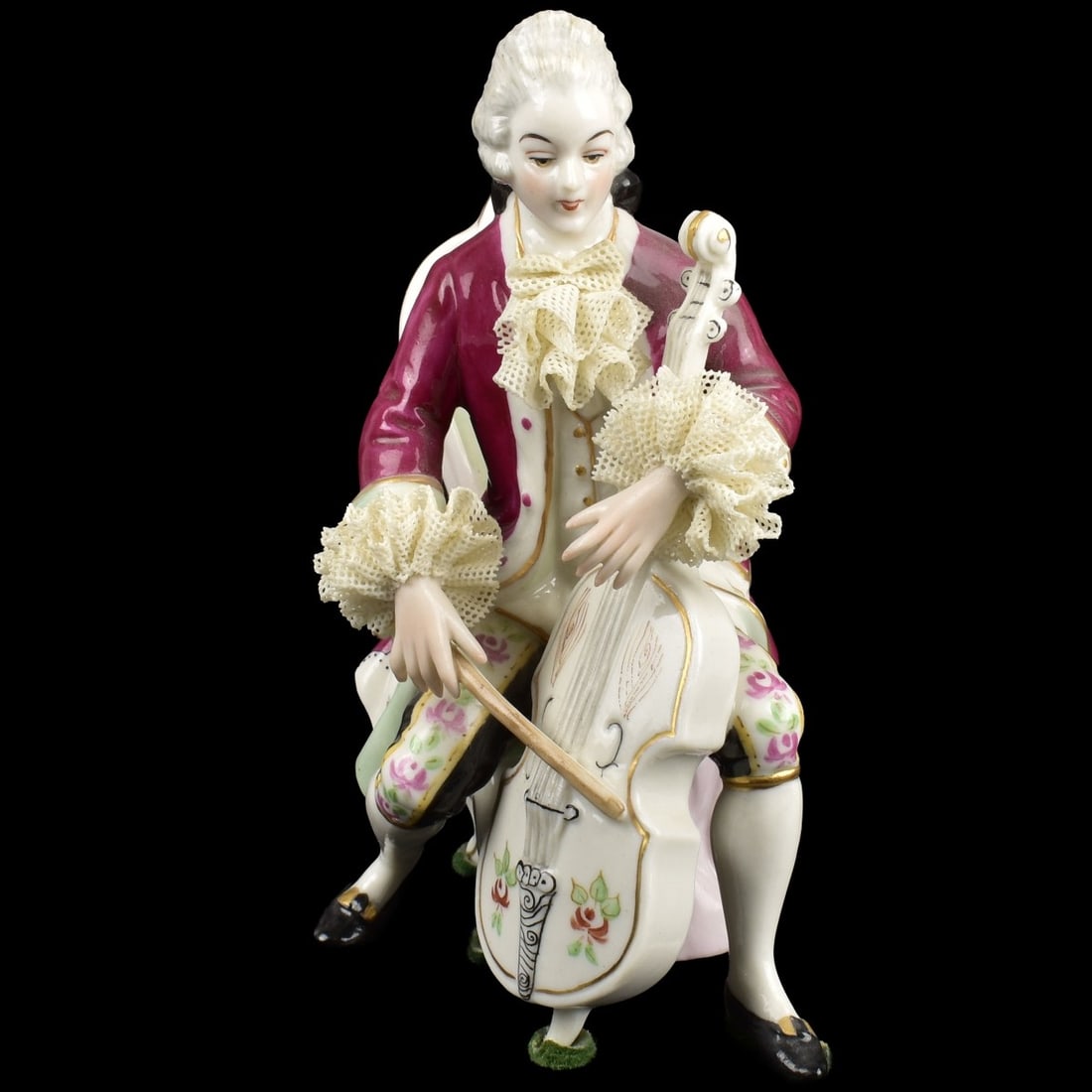 Muller Volkstedt Lace Musical Porcelain Sculpture: Muller Volkstedt Dresden Lace Musical Porcelain Sculpture. Marked to the bottom. Measures: 5" high, 2-3/4" wide, 3-3/4" deep. Kodner Galleries offers phone and absentee bidding at a low, flat 21% buye