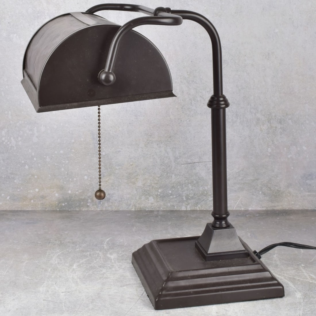 Mid-century Metal Bankers Desk Lamp: Mid-century Metal Bankers Desk Lamp. Measures: 14-1/2" high, 10-1/2" wide, 10" deep. Kodner Galleries offers phone and absentee bidding at a low, flat 21% buyer’s premium without surcharge or hidden