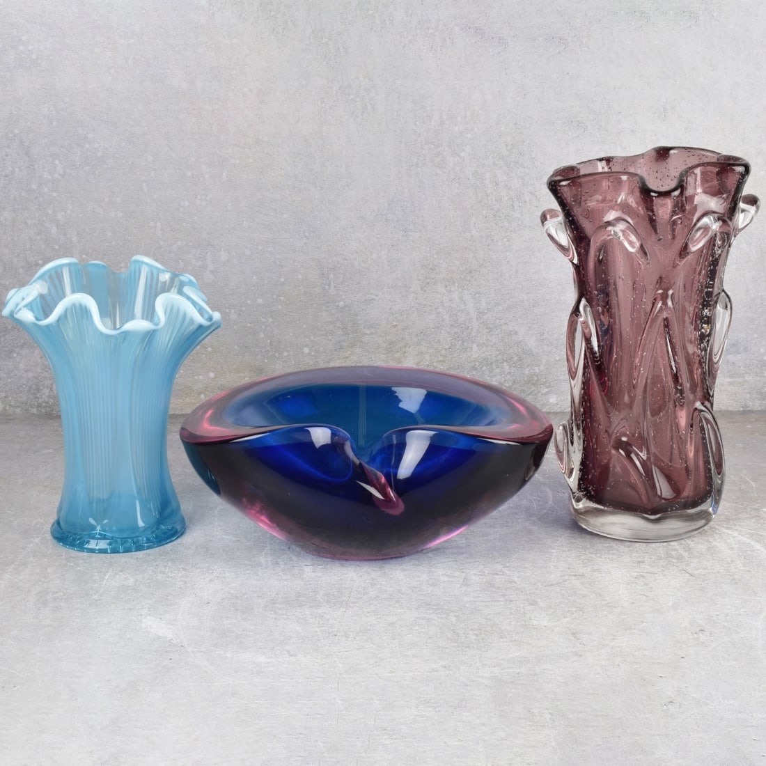 Modern Art Glass Tableware: Three (3) Modern Art Glass Tableware Pieces. Consisting of one (1) thick walled kidney shape bowl, signed to the bottom, measures: 3-1/2" high, 9-1/2" wide, 7-3/4" deep, one (1) thick walled cylindric