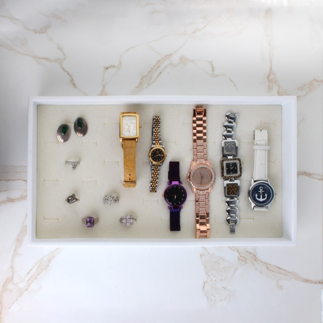 Lot of Fashion Jewelry-Rings, Watches, Earrings: Nice Box Lot of Fashion Jewelry. Consisting of six (6) watches of various makers, including one (1) Invicta Swiss with mother of pearl, and one (1) Orient Oyster automatic 21 jewels two tone, gold pla