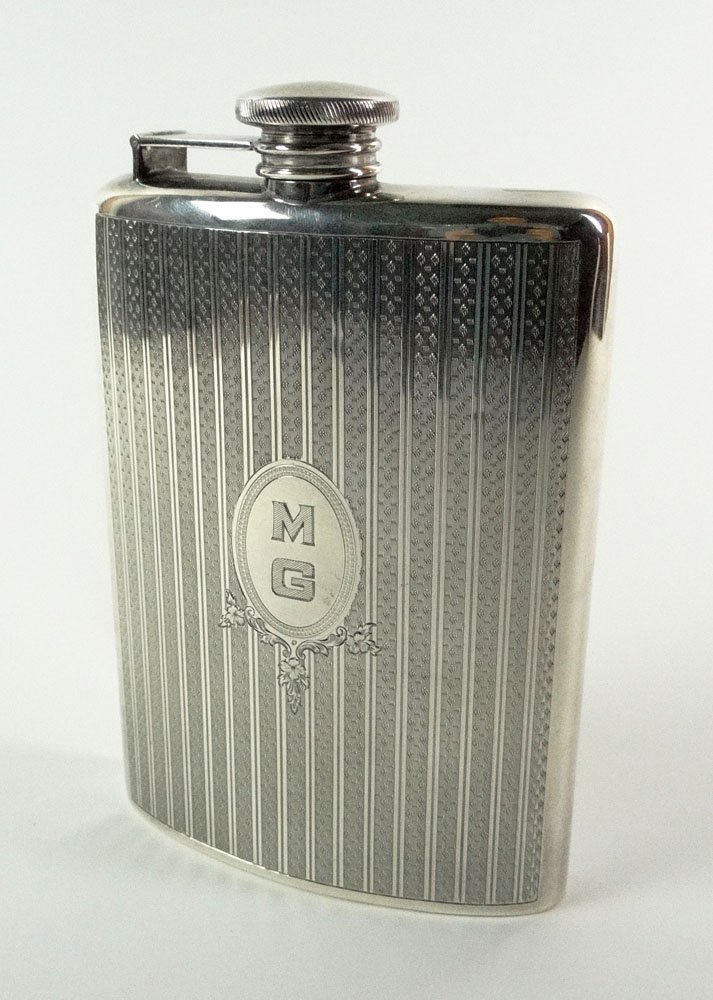20th Century J. S. Co. Sterling Silver Hip Flask. Signe: 20th Century J. S. Co. Sterling Silver Hip Flask. Signed J. S. Co., Logo, Sterling, 165-5 and 3/4 Pint. Minor Scratching, Pings from Use or else Very Good Condition. Has MG Monogram. Measures 6-1/2 In
