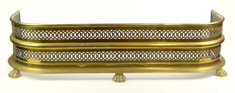 19/20th Century Pierced Brass Fireplace Fender with Paw: 19/20th Century Pierced Brass Fireplace Fender with Paw Feet. Unsigned. Very Good Condition, Looks Polished Recently. Unsigned. Measures 10 Inches Tall and 40-1/2 Inches Wide. Shipping $70.00