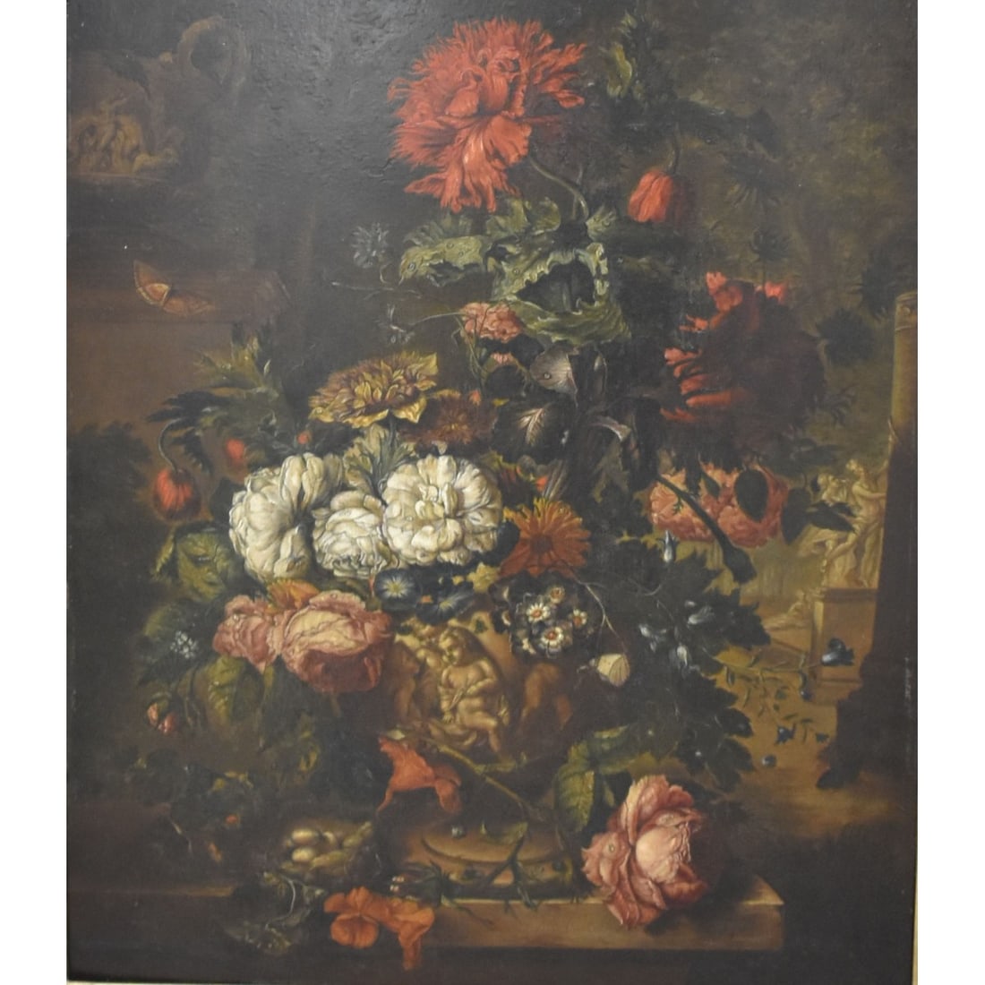 Jan van Huysum, Dutch (1682-1749): After: Jan van Huysum, Dutch (1682-1749) Still Life of Flowers Arraigned in an Urn. 20th Century. Signed in the base of the urn. Image measures: 19 high, 16" wide, frame measures: 32" high, 29" wide.