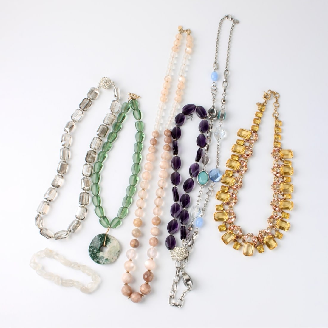Fashion Necklaces and Bracelet: Six Vintage Fashion Necklaces and One Bracelet. To include hardstone, quartz and faux gemstones. Silver and gold tone metal. Various makers and styles. Kodner Galleries offers phone and absentee biddi