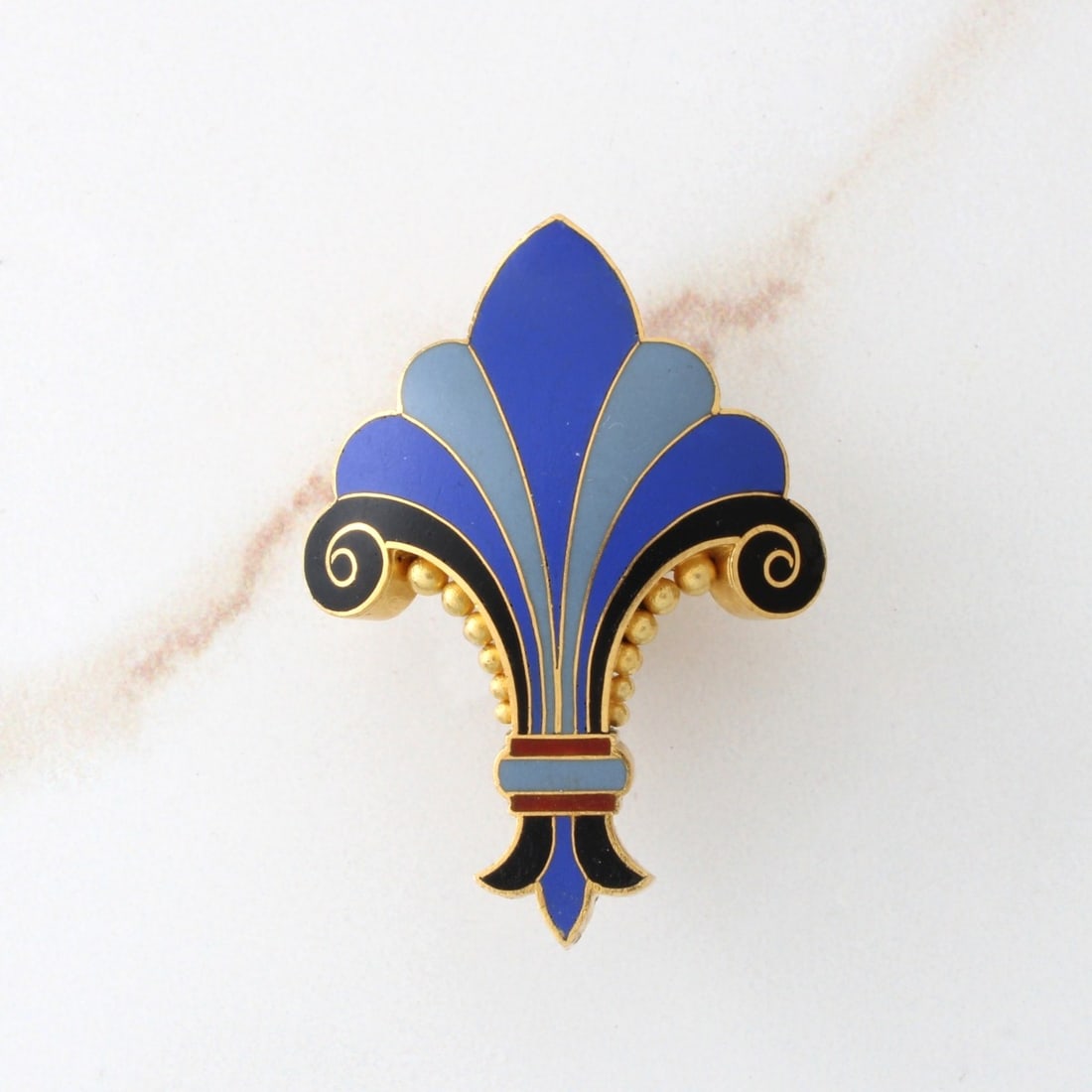 22K and Enamel Fob: Rare 19th Century 22 Karat Yellow Gold and Finely Painted Enamel Fleur De Lis Fob / Pendant. Tested 22K on X-ray gun. Measures 1-1/4" L, 1" W. Approx. weight: 6.99 grams. Kodner Galleries offers phone