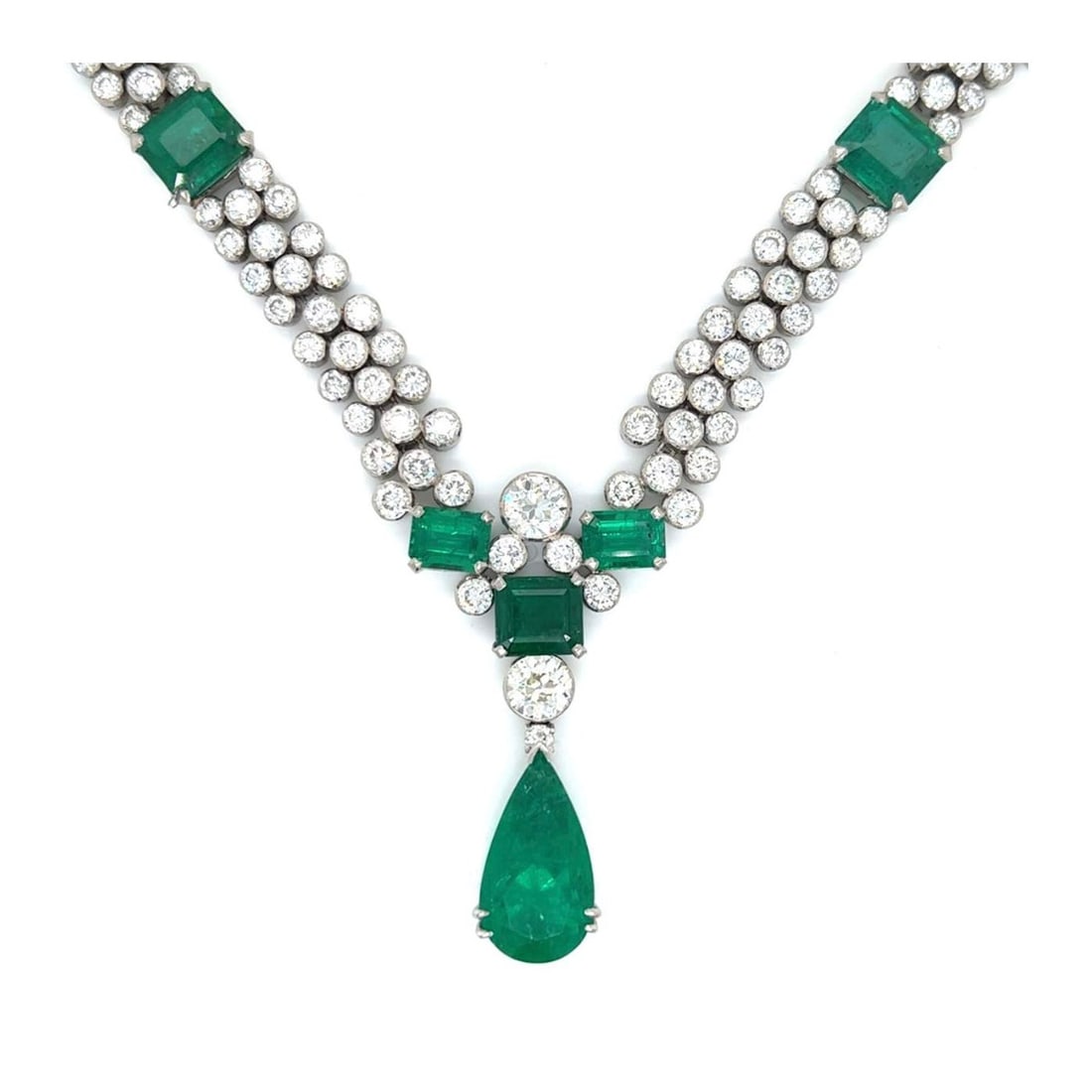 GIA Emerald, Diamond and Platinum Necklace: Magnificent Art Deco GIA Certified Colombian Emerald, Diamond and Platinum Pendant Necklace. Set with a GIA certified 11.16 carat pear shape Colombian emerald. Accented with 30.0 carat TW eleven Colom