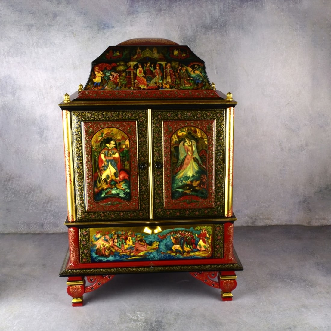 Important Russian Lacquered Cabinet: Very Fine and Important Unusually Large Russian Lacquered Cabinet With Two Exterior Doors to Reveal Additional Doors and Several Pull out Drawers with a Large Slide out Drawer Below. Decorated on all