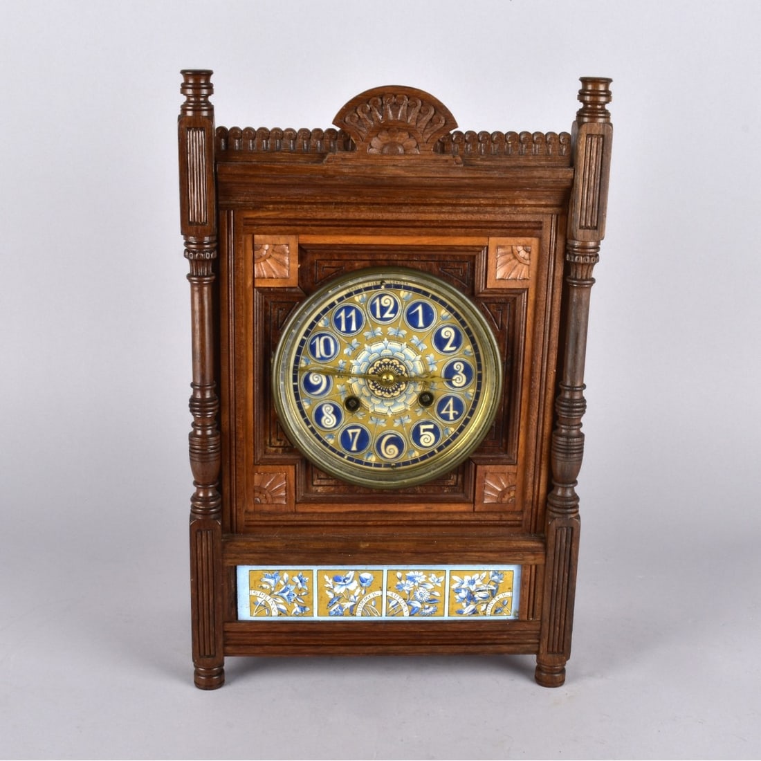 Leroy & Fils London Mantel Clock: Leroy & Fils, London Wooden Mantel Clock with Enamel face of flowers and butterfly's around a center flower, with a panel at bottom of the seasons. Marked to top of dial Leroy & Fils - London, and mar