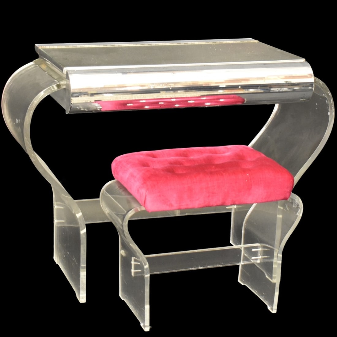 Lucite Make Up Table and Stool: Lucite Vanity Make Up Table with Flip Up Mirror Top and Slide Out Drawer with Matching Upholstered Stool. Table measures: 29" high, 38" wide, 19-1/2" deep, bench measures: 18" high. Kodner Galleries o