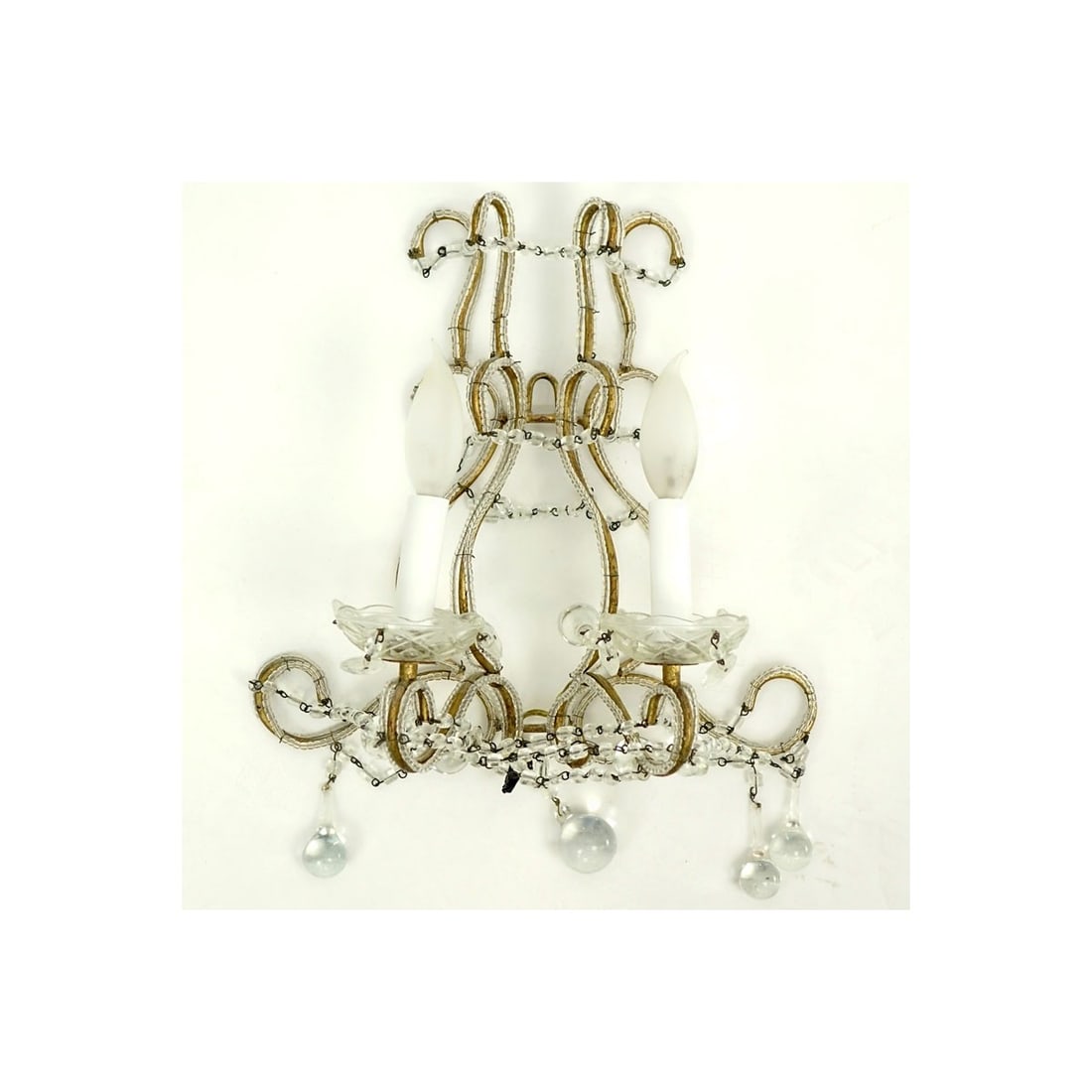 Vintage Crystal Beaded Metal Sconce: Crystal Vintage Beaded Metal Sconce. Unsigned. Measures 15" H x 13" W. Kodner Galleries offers phone and absentee bidding at a low, flat 21% buyer’s premium without surcharge or hidden fees. For inf