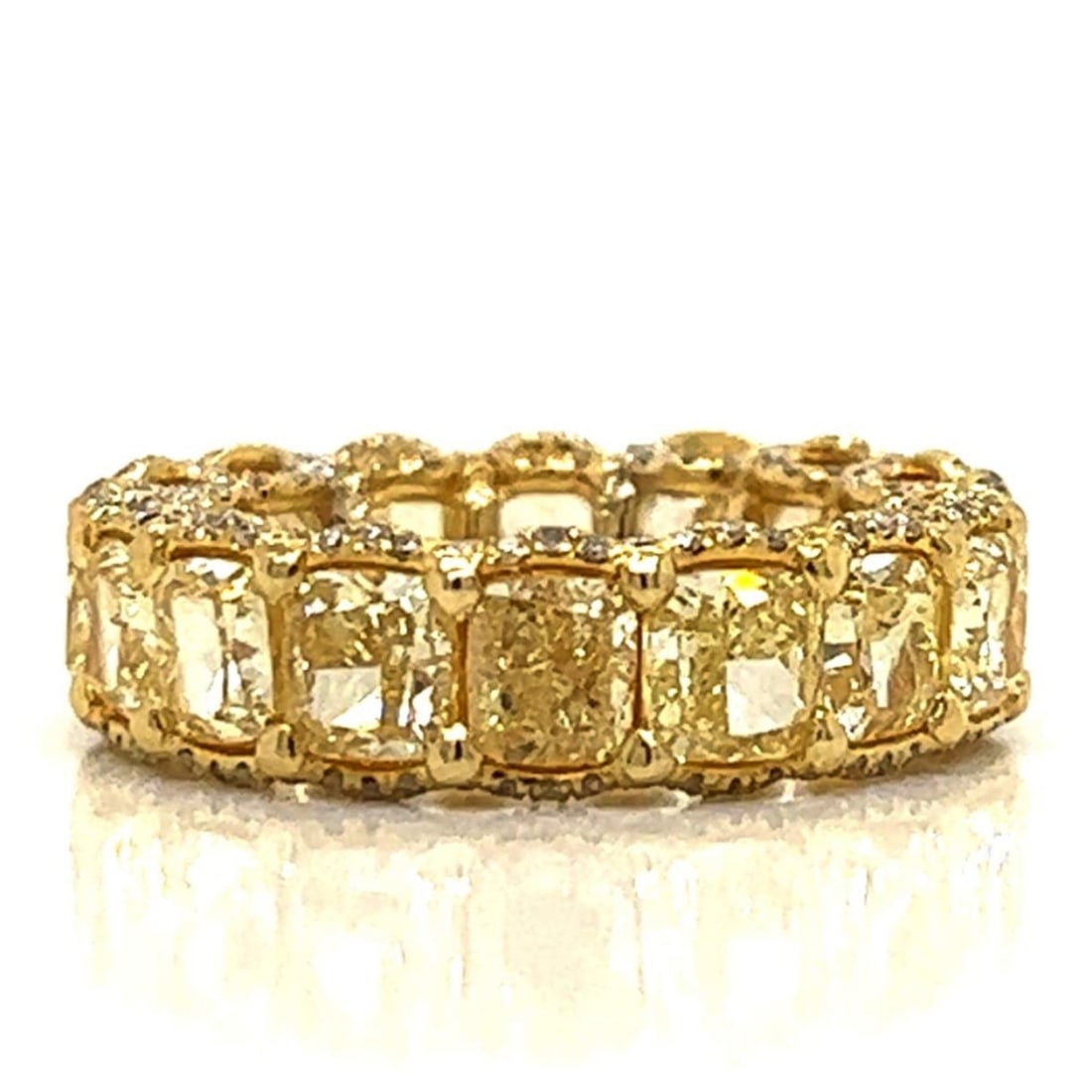 Diamond and 18K Ring: Vintage Lugano Approx. 7/20 Carat TW Sixteen Cushion Cut Fancy Yellow Diamond, 2.40 Carat TW Round Brilliant Cut White Diamond and 18 Karat Yellow Gold Eternity Band. Yellow diamonds VVS-VS clarity. W