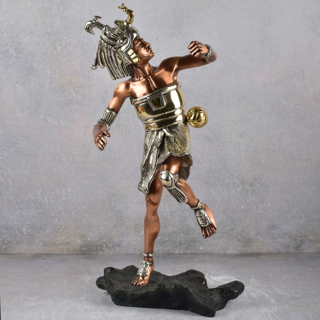 Martin Mendozza (20th Century): Martin Mendozza (20th Century) "Aztec Ball Player" D'Argenta Mexico Silver, Copper Silver Clad and 24K Plated . Signed in the bronze with a bottom tag with serial number 5255481. Overall measures: