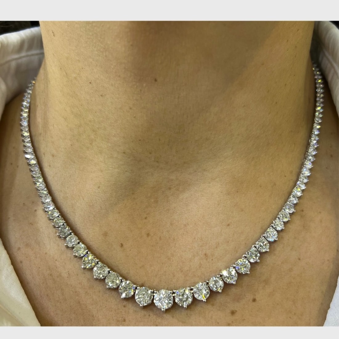 Diamond and 14K Necklace: Approx. 17.20 Carat TW One Hundred Forty-three Graduated Round Brilliant Cut Diamond and 14 Karat White Gold Necklace. Diamonds G-I color, VS2-SI3 clarity. Measures 16" L. Approx. weight: 22.4 grams.