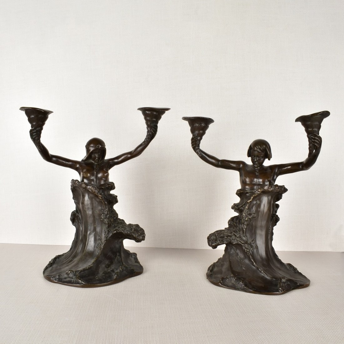 Art Nouveau Bronze Candelabra: A pair of Art Nouveau Bronze Two Arm Candelabra. Attributed to Charles Louchet, French 1854-1936. Measures: 12-1/2" H, 11-1/4" W, 7" D. Kodner Galleries offers phone and absentee bidding at a low, fla