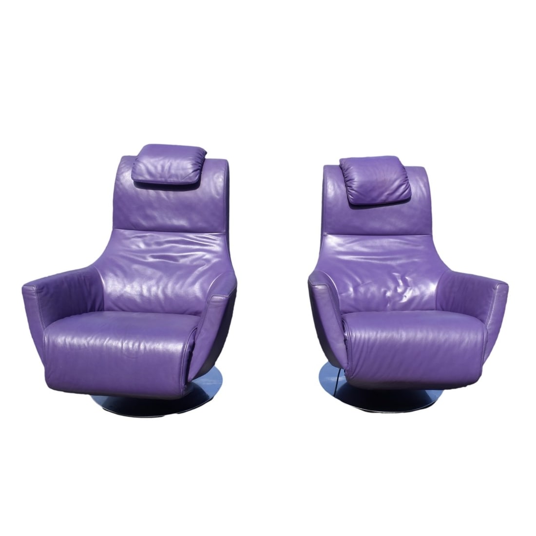 Kundenleder Vintage Chairs: Pair of Vintage Kundenleder German Vintage Purple Leather Chairs with Electric Foot Rests on Chrome Round Bases. Measures 38" H, 30" W, 35" D. Kodner Galleries offers phone and absentee bidding at a