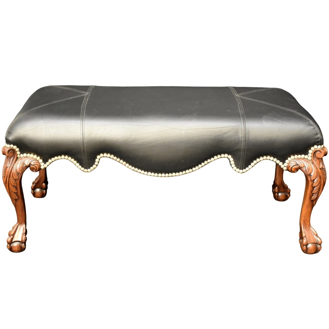 Georgian Style Bench: Georgian Style Simulated Black Leather Upholstered Bench with Carved Claw and Ball Legs. Measures: 21" high, 44" wide 22" deep. Kodner Galleries offers phone and absentee bidding at a low, flat 21% bu