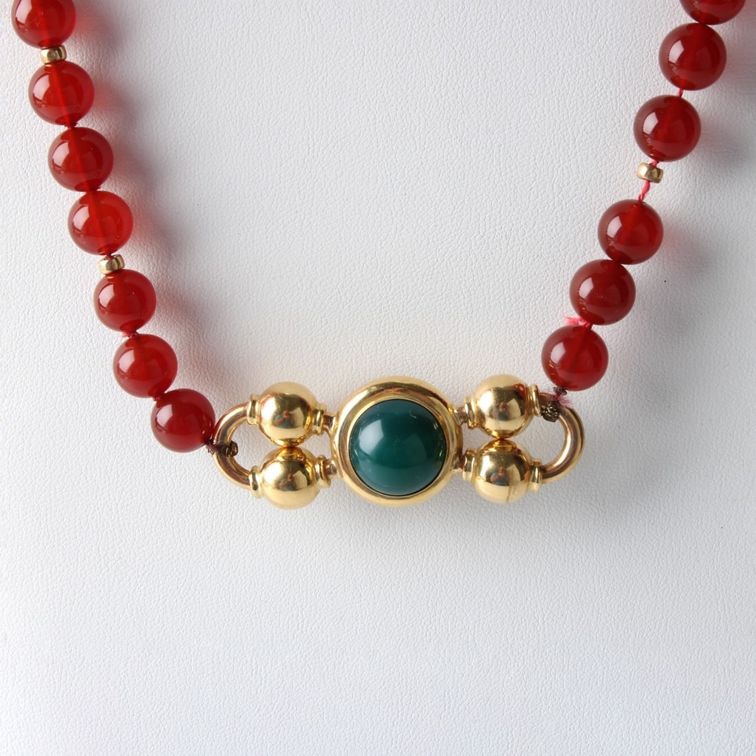 18K, Carnelian and Chrysoprase Necklace: Vintage Heavy 18 Karat Yellow Gold, Cabochon Carnelian and Chrysoprase and 10mm Carnelian Bead Necklace with Yellow Gold Spacers. Gold enhancers measure 2-1/4" L, 3/4" W. Necklace measures 32" L.