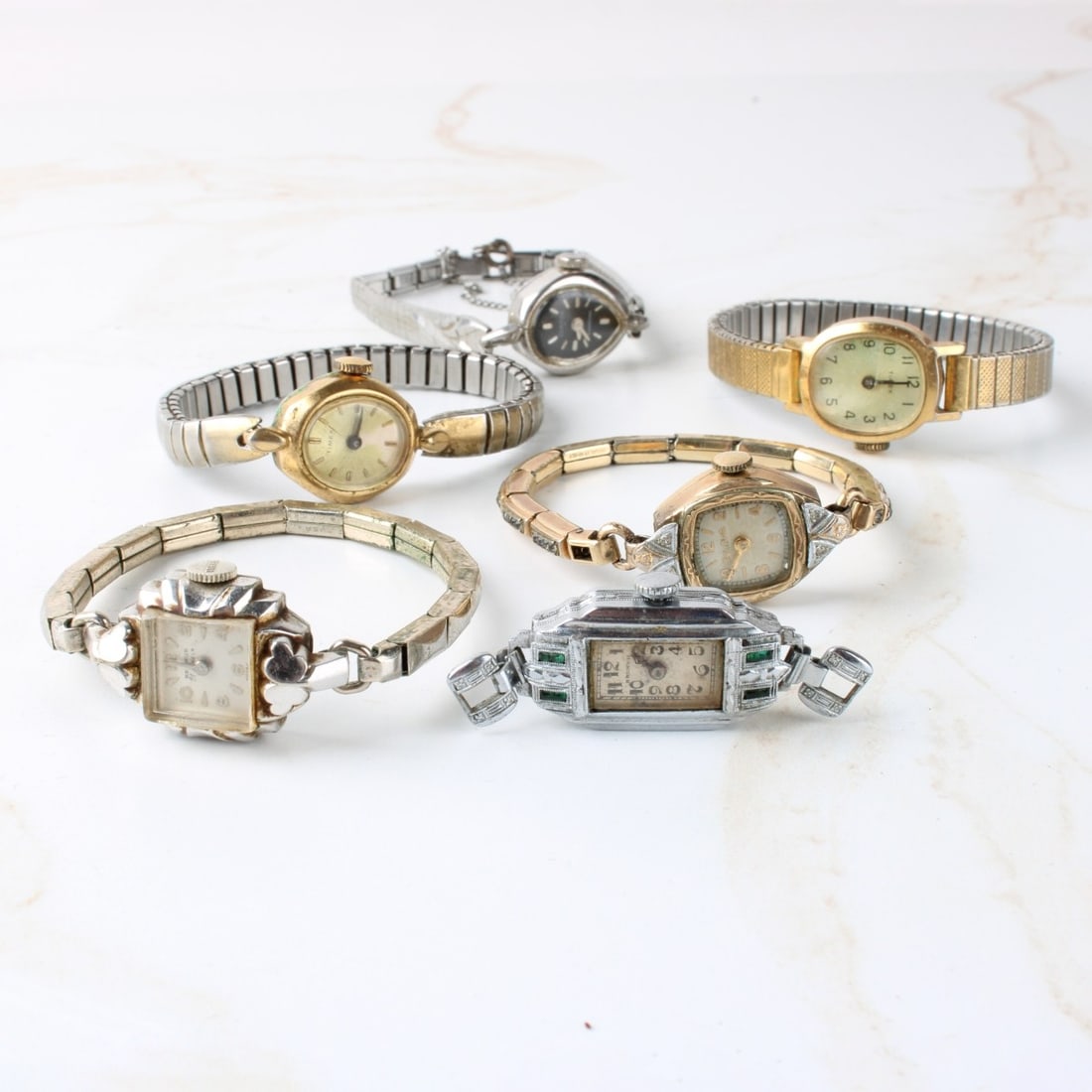 Ladies Vintage Wrist Watches: Six (6) Ladies Vintage Wrist Watches with Expandable Bands. Including Timex, Bulova, Clinton and others. Kodner Galleries offers phone and absentee bidding at a low, flat 21% buyer’s premium without