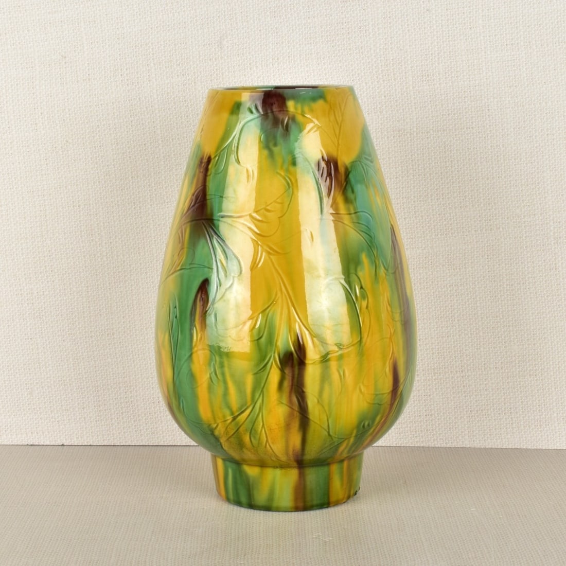 Japanese Glazed Ceramic Vase: Japanese Glazed Ceramic Vase, Artist Signed on the Bottom, 20th century. Measures: 10-1/4" H, 6-1/2 : Dia. Kodner Galleries offers phone and absentee bidding at a low, flat 21% buyer’s premium witho