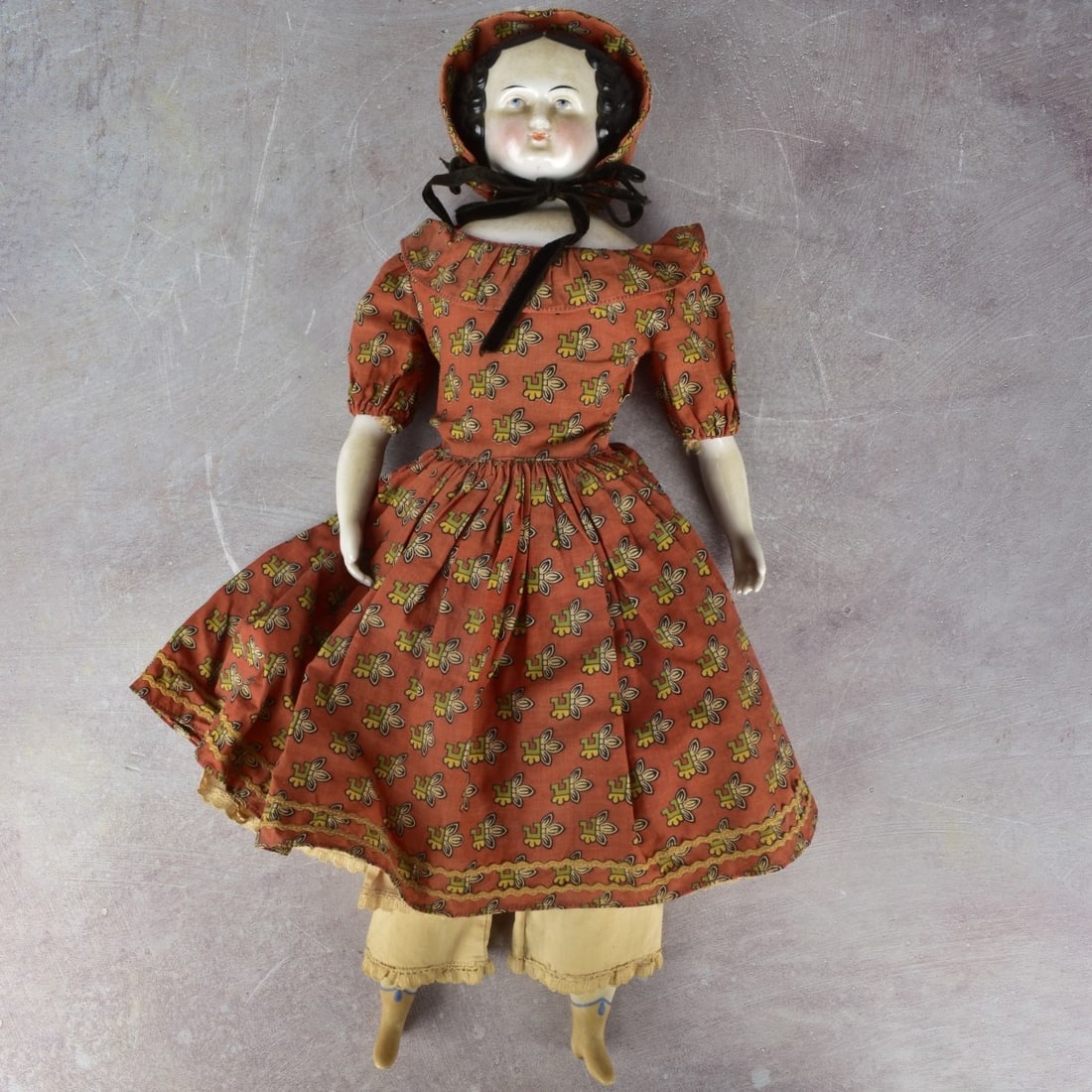 Rare Antique German Porcelain Head Doll: Rare Antique German Doll with Glazed Porcelain Head , Arms and Feet Doll. Circa 1860. Measures" 16-1/2" high. Kodner Galleries offers phone and absentee bidding at a low, flat 21% buyer’s premium wi