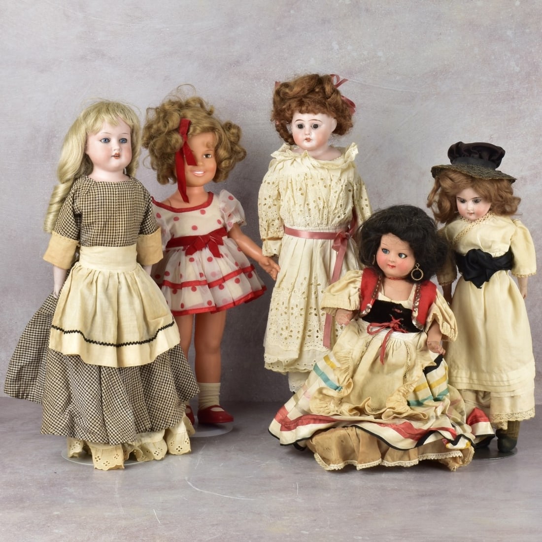 Collection of Antique Dolls: Collection of Five (5) Antique Dolls. Consisting of one (1) German Ernst Heubach doll with bisque head and hands, one (1) German doll marked "Germany 370", three (3) composite dolls. Tallest doll meas