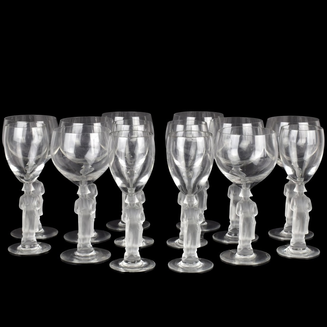 Bayel French Figural Glasses: Fourteen (14) Bayel French Clear and Frosted Figural Stem Wine Glasses. 20th century. Modeled as Napoleon standing with his characteristic stance and mounted to a circular base. Eight larger