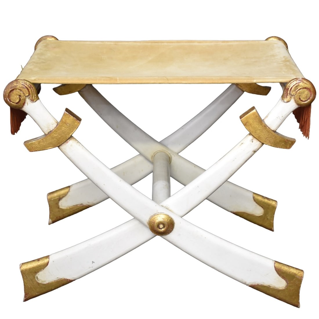 Carved Giltwood Folding Bench: Carved Giltwood Folding Bench with Cloth Cover and Fringe. Measures: 18" high, 21" wide, 13" deep. Kodner Galleries offers phone and absentee bidding at a low, flat 21% buyer’s premium without