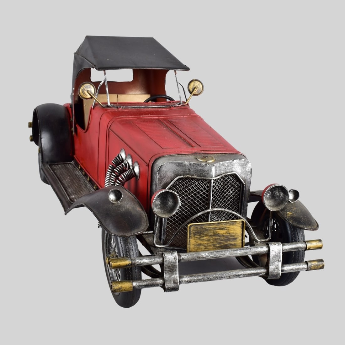 Vintage Model of a 1930s Mercedes Benz: Vintage Model of a 1930s Mercedes Benz. Measures 10-1/2" x 10-1/4" x 25". Kodner Galleries offers phone and absentee bidding at a low, flat 21% buyer’s premium without surcharge or hidden fees. For