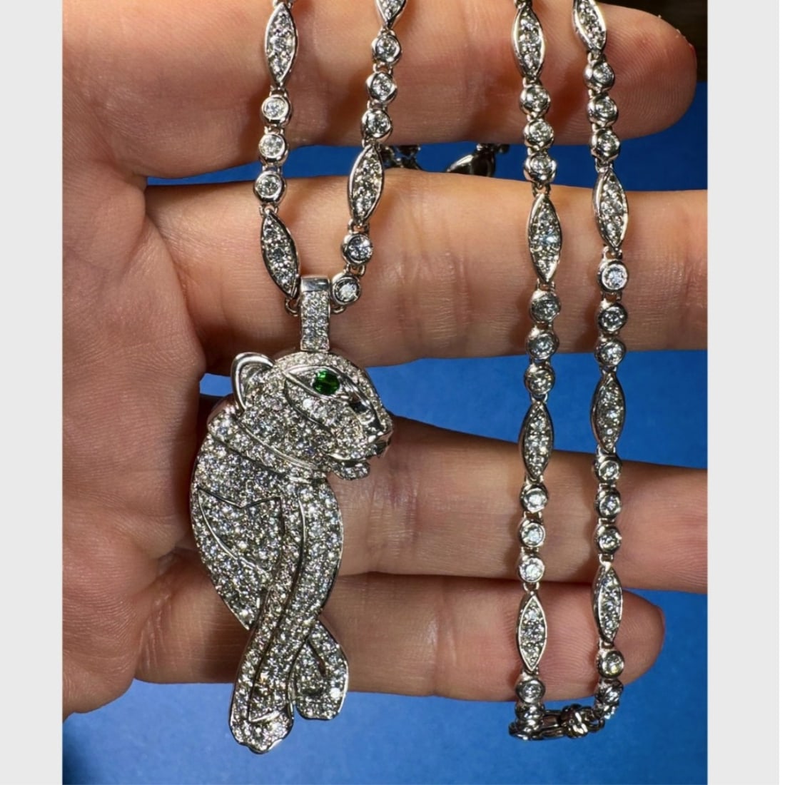 Diamond and Gold Panther Necklace: Very Fine Approx. 7.90 Carat TW Two Hundred Thirty Pave Set Round Brilliant Cut Diamond, 18 Karat and 14 Karat White Gold Panther Pendant Necklace. Diamonds D-F color, VVS-VS clarity. Pendant