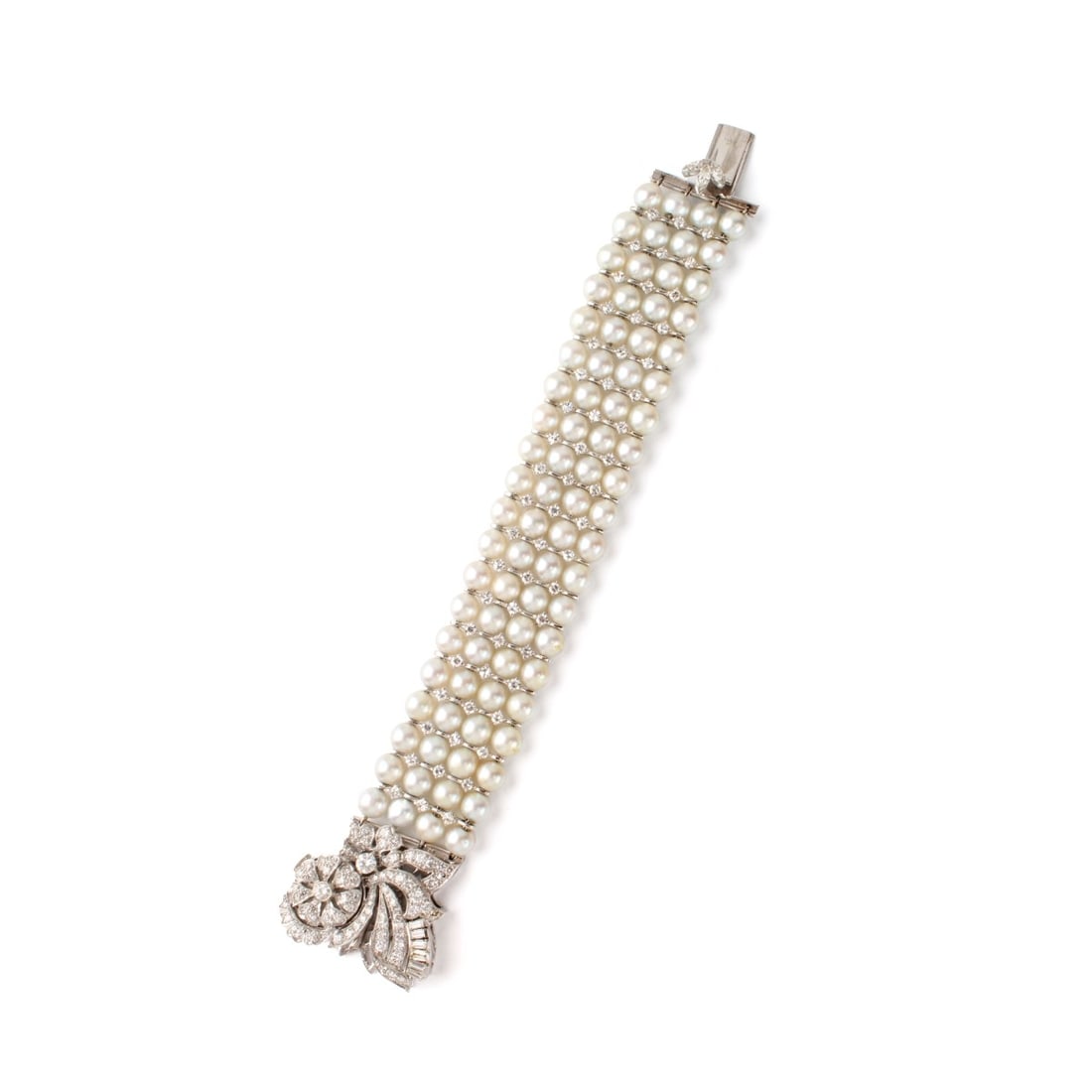 Diamond, Pearl and 14K Bracelet Watch: Vintage Circa 1950s Approx. 6.0 Carat TW Round Brilliant, Baguette and Marquise Cut Diamond, 6.6-6.7mm Pearl and 14 Karat White Gold Bracelet with Hidden Panto 17 Jewel Watch. Diamonds F-G color,