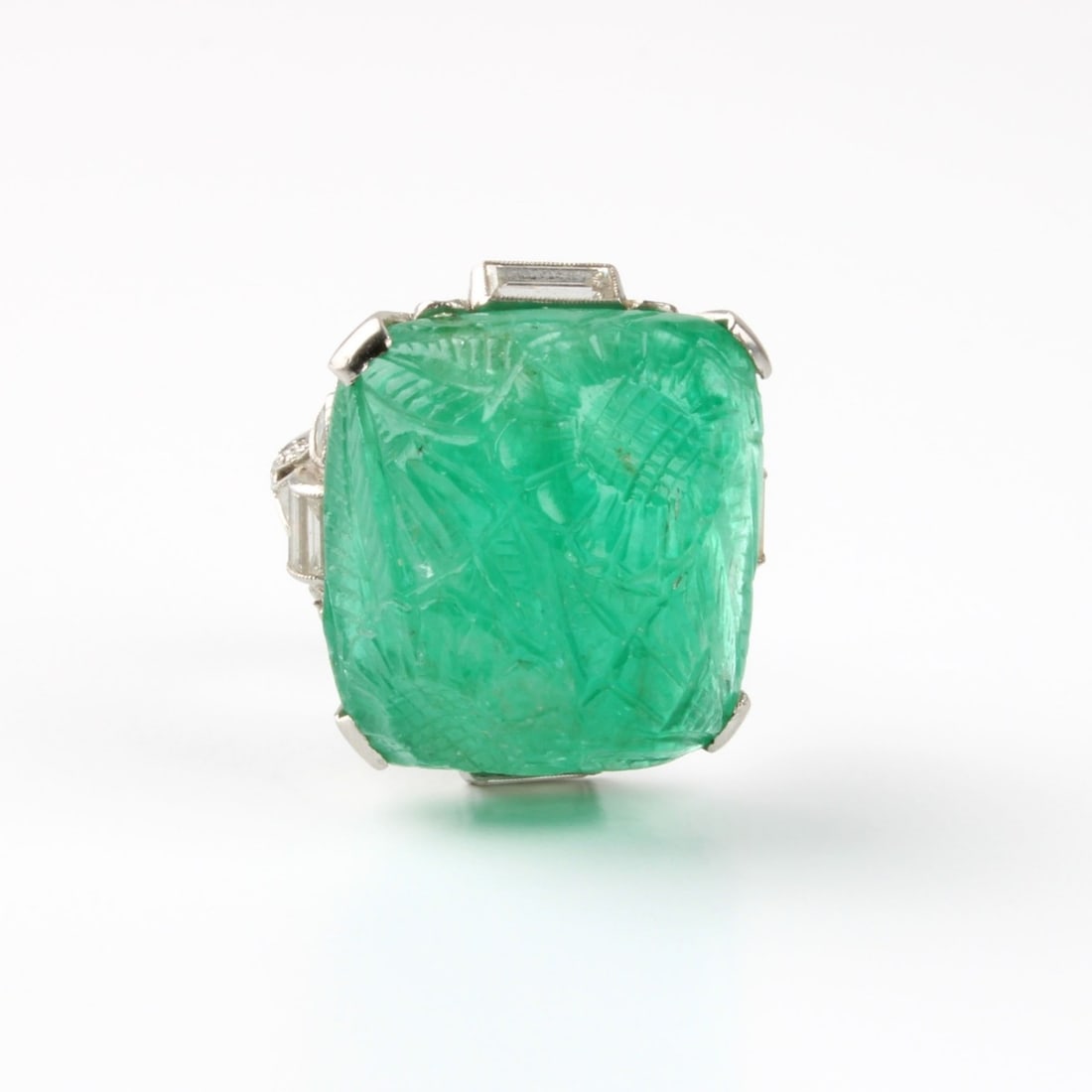 Deco Emerald, Diamond and Platinum Ring: Fine Antique Art Deco Large Carved Emerald, Diamond and Platinum Ring. Accented with approx. 1.35 carat TW round, baguette and trilliant cut diamonds, F-G color, VS1-VS2 clarity. Emerald measures 13/1