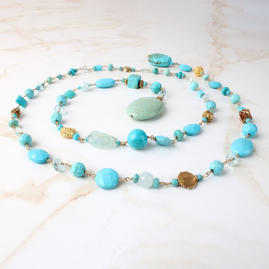Turquoise, Gemstone and Quartz Necklace: Vintage Vintage Turquoise, Gemstone and Quartz Lariat style Necklace. Measures 39" L. Approx. weight: 70.75 grams. Condition: Very good vintage condition. Estimate: $300.00 - $500.00 In-House