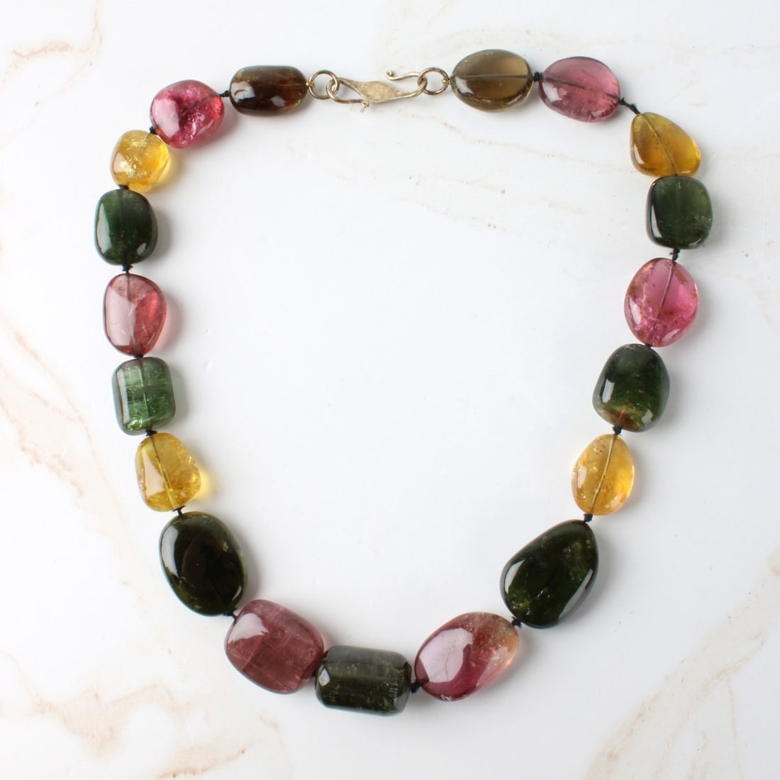 Tourmaline and Citrine Necklace: Vintage Large Multi Color Tourmaline and Citrine Necklace with Silver Clasp. Largest stone measure 1" x 5/8". Necklace measures 17-1/2" L. Approx. weight: 112.26 grams. Condition: Very good
