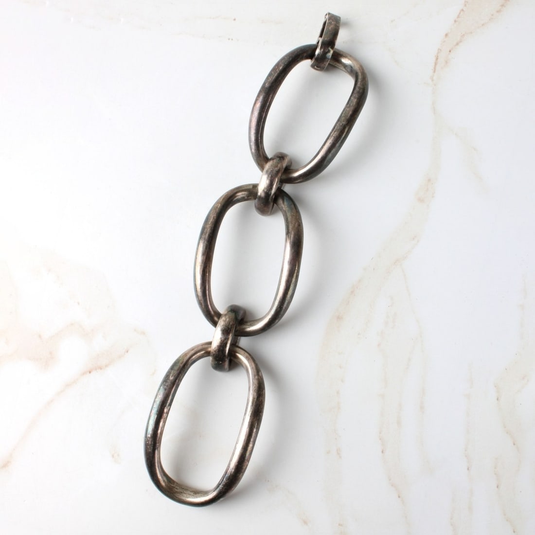 Sterling Silver Bracelet: Vintage Modern Sterling Silver Large Link Bracelet. Measures 7-1/2" L, 1-1/2" W. Approx. weight: 61.63 grams. Condition: Good vintage condition. Needs cleaning / polishing. Estimate: $100.00 -