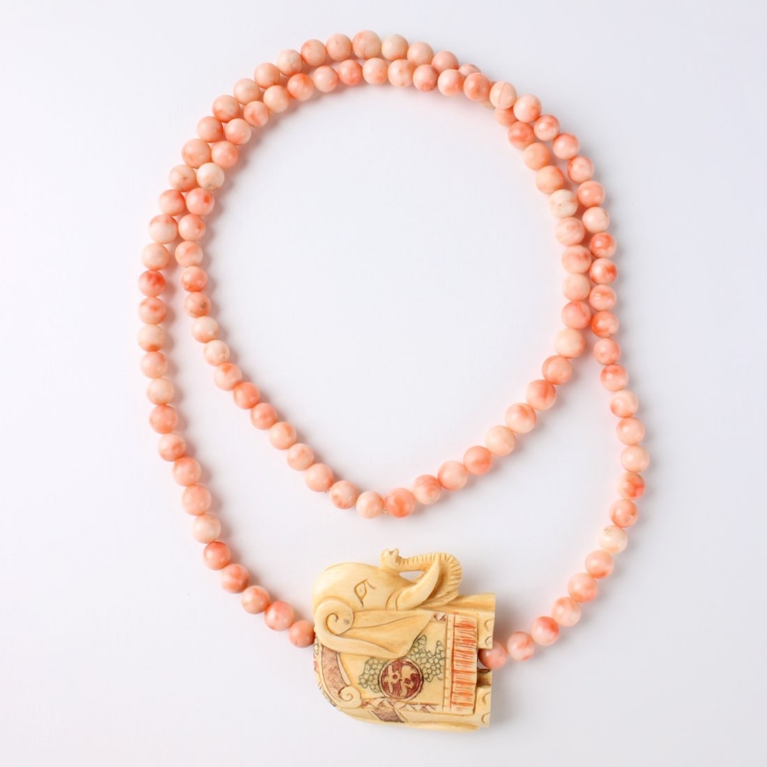 Chinese Single Strand Necklace: Vintage Chinese Singe Strand Angle Skin Pearl Necklace with Well Carved Elephant Pendant. Approximately 6-1/2 mm. Measures: 29" long, pendant measures: 1-7/8" high, 1-7/8" wide. We Will Not Ship This