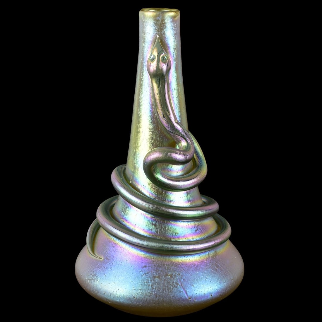 Loetz Art Nouveau Art Glass: Loetz Snake Art Glass Bud Vase with an Applied Iridescent Slithering Snake to the Side. Measures: 7" high, 4" diameter. Kodner Galleries offers phone and absentee bidding at a low, flat 21% buyer’s
