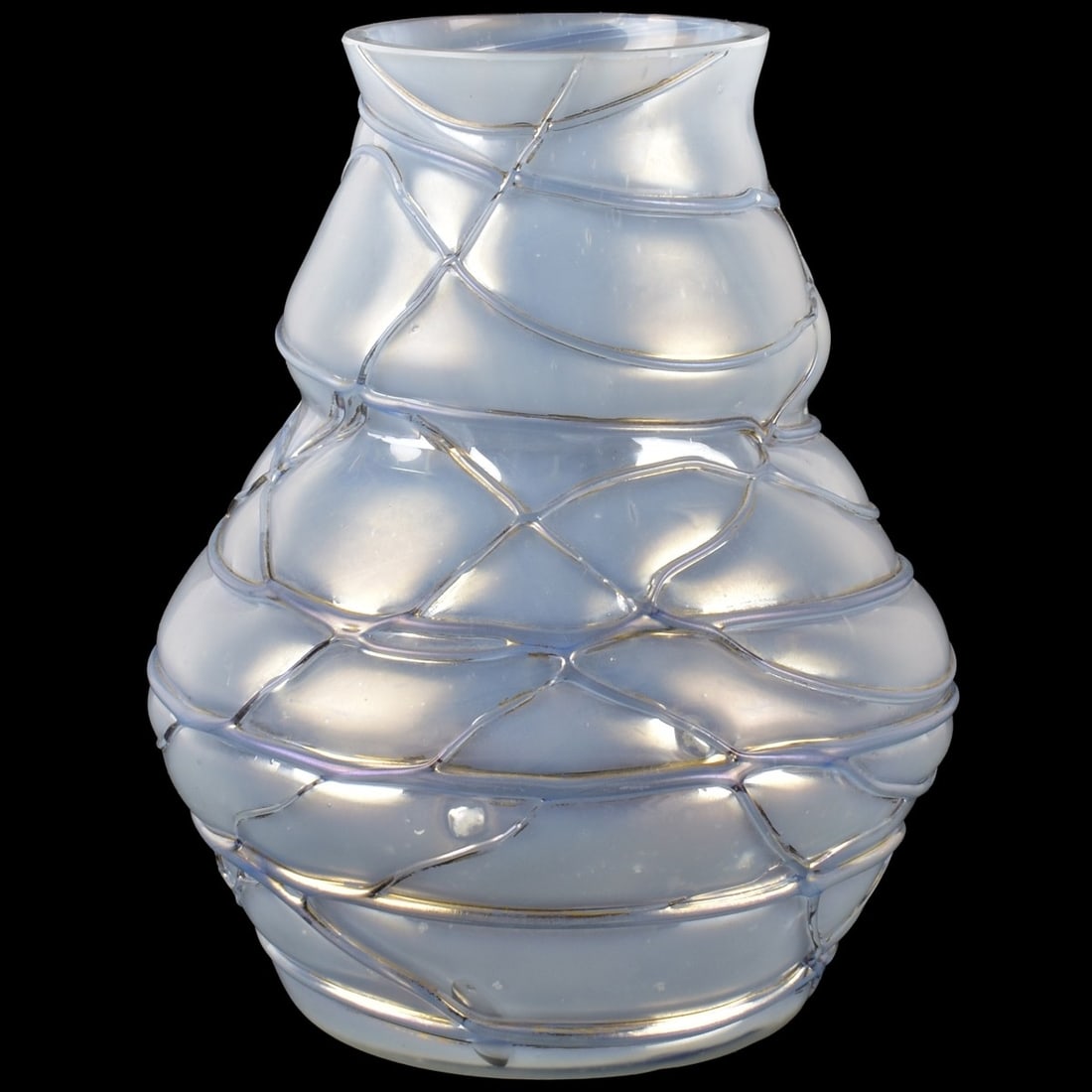 Loetz Art Nouveau Art Glass: Loetz Iridescent White Opal Art Glass Vase with a Threaded Design. Measures: 5" high, 41/8" diameter. Kodner Galleries offers phone and absentee bidding at a low, flat 21% buyer’s premium without