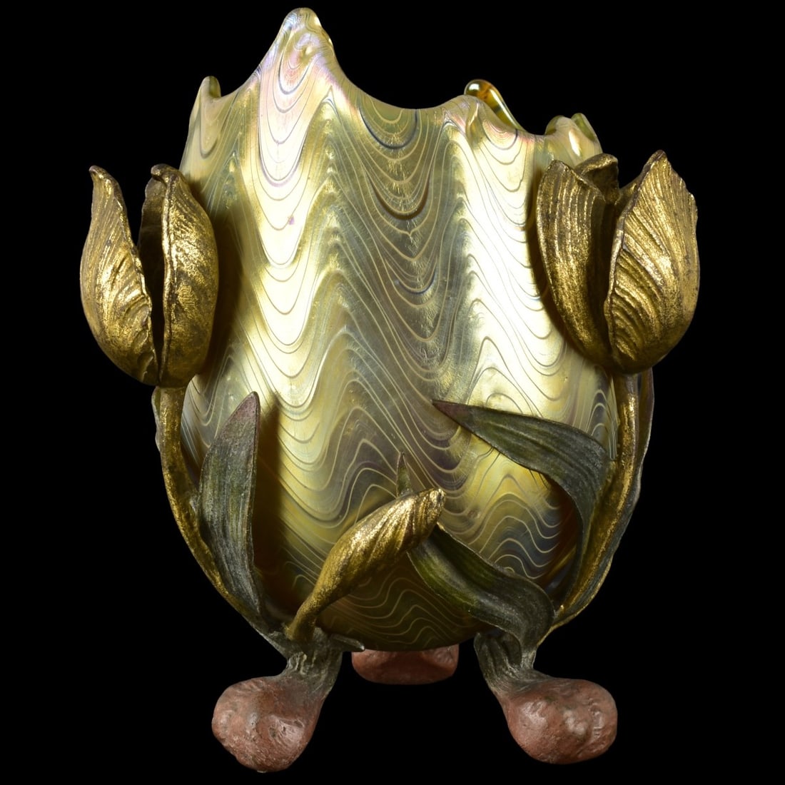 Loetz Art Nouveau Art Glass: Loetz Creta Art Glass Vase with a Phanomen Decoration Design Having a Patinated Bronze Three Footed Stand. Measures: 7" high, 4-1/8" diameter. Kodner Galleries offers phone and absentee bidding at a