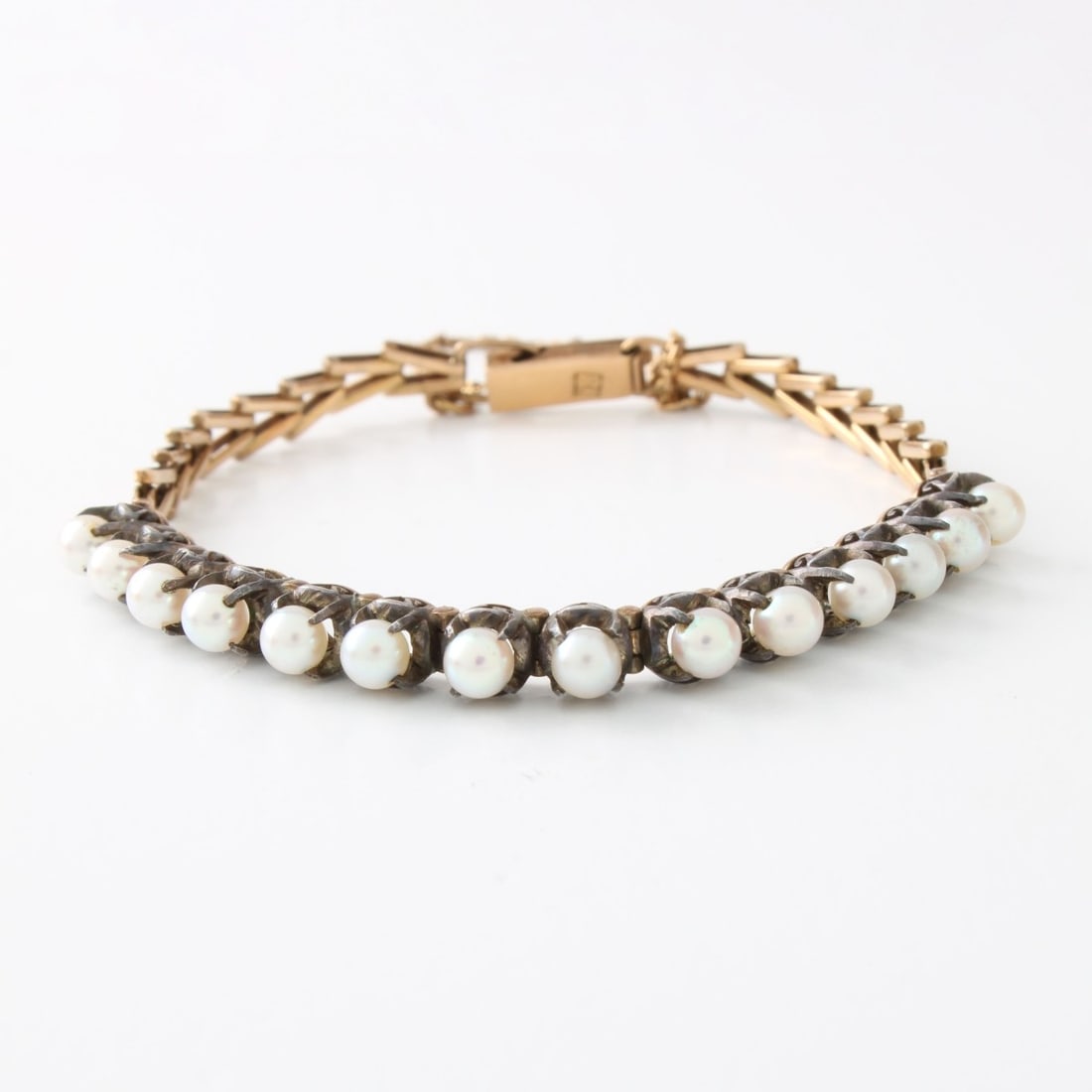 Pearl, 18K & Platinum Bracelet: Antique 4mm Natural Pearl, 18 Karat Yellow Gold and Platinum Bracelet. Pearls with good luster and polish. Measures 6" L. Approx. weight: 10.20 grams. Kodner Galleries offers phone and absentee