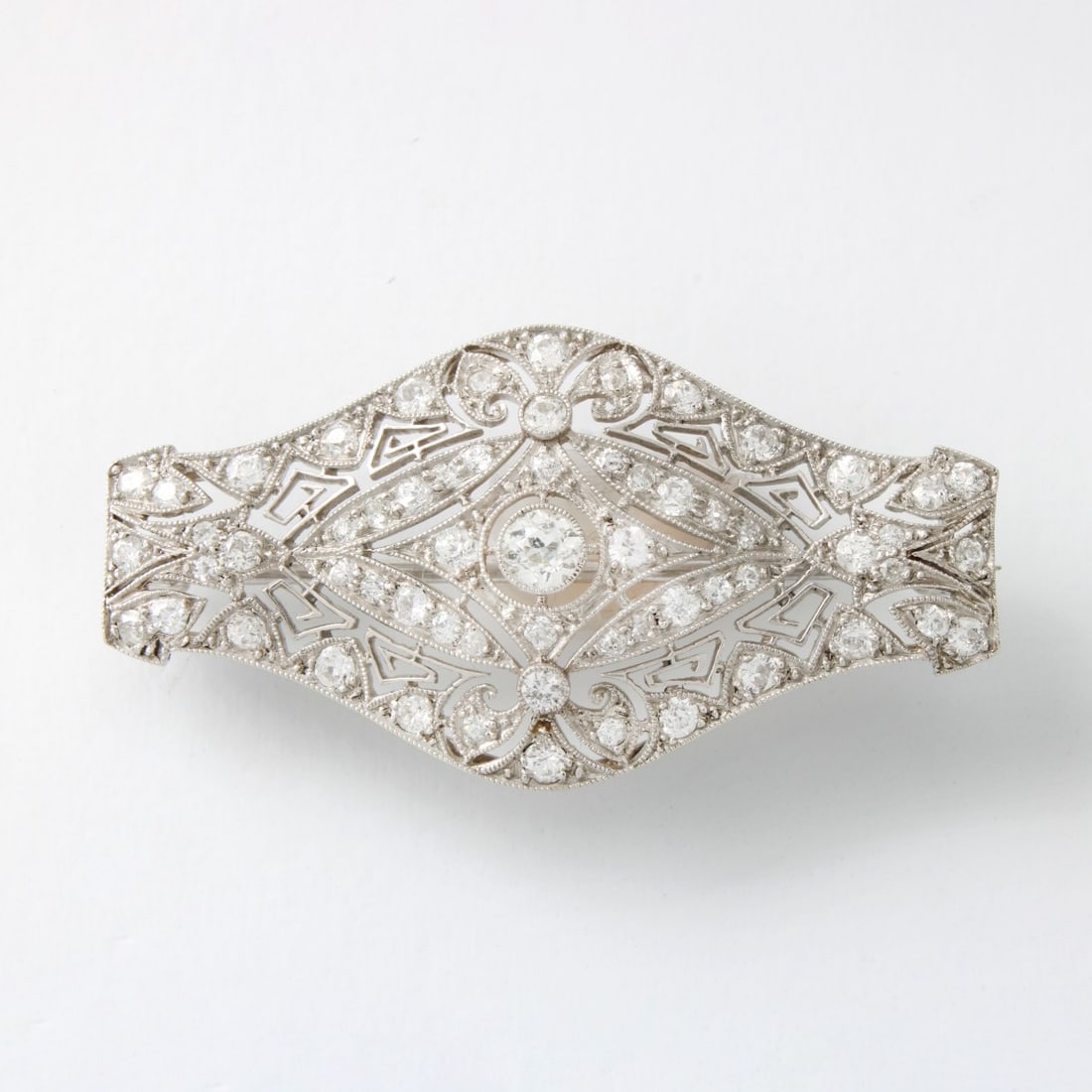 Tiffany Diamond and Platinum Pin: Antique Tiffany & Co Approx. 2.0 Carat TW Old European Cut Diamond and Platinum Pin. Diamonds G-H color, VS-SI clarity. Measures 7/8" x 1-5/8". Approx. weight: 8.70 grams. Kodner Galleries offers