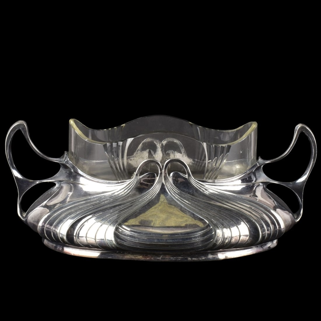 German Orivit Art Nouveau Bowl: German Orivit Art Nouveau Silver Plated Stand and Crystal Bowl Insert. Circa 1905. Stamped "ORIVIT 2418" to the bottom. Overall with bowl inserted 4" high, 9-3/4" long, 5-3/4" deep. Kodner Galleries