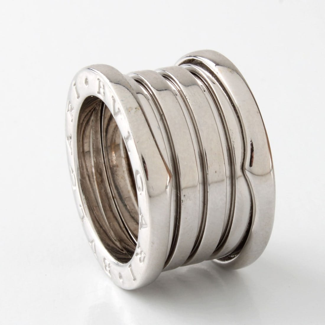 Bulgari 18K Ring: Vintage Bulgari 18 Karat White Gold Ring. Signed, stamped 7500, Italian hallmark. Size 51 (US 5-3/4). Approx. weight: 13.57 grams. Kodner Galleries offers phone and absentee bidding at a low, flat